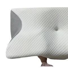 Oreiller ergonomique à mémoire de forme soutenant la tête et le cou pendant le sommeil sur le dos